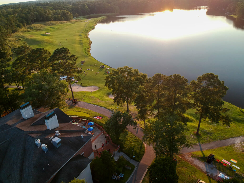 over head shot of the windemere club in Blythewood SC showing large pond, country club and beautiful green space
