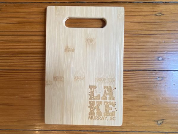 small bar size bamboo cutting board with Lake Murray, SC in the lower right hand corn with LA stacked on top of KE