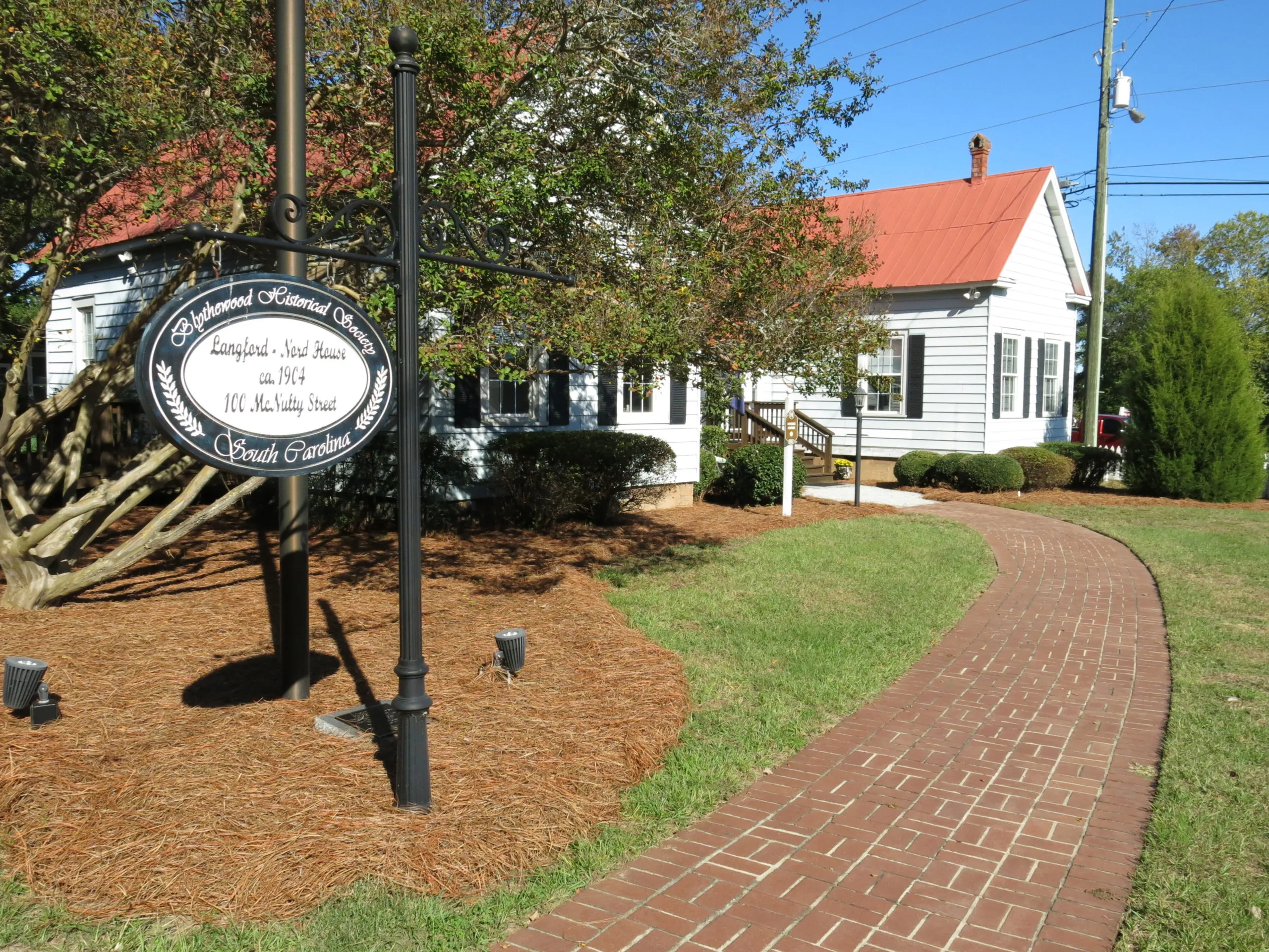 Blythewood Historical Museum sign with walkway to museum