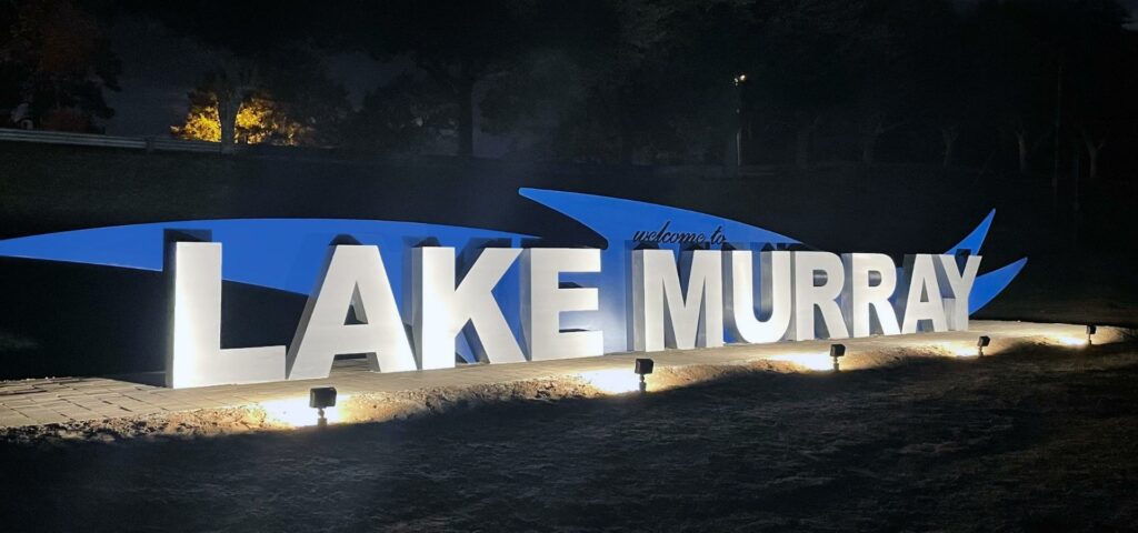 Lake Murray Destination Landmark sign lit up at night