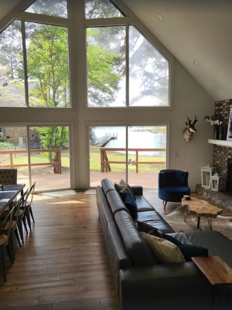 Spacious room with large windows to see Lake Murray