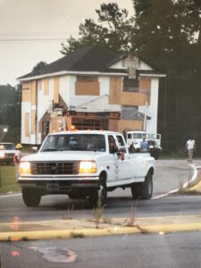 Lorick Plantation house is pulled by white truck as it is moved to North Lake Drive.
