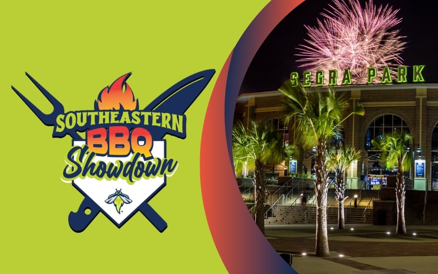 Southeastern BBQ Showdown Logo depicting a chefs knife and spatula on a lime green background. a photo of Segra Park with fireworks bursting over the top of the stadium is on the right side.