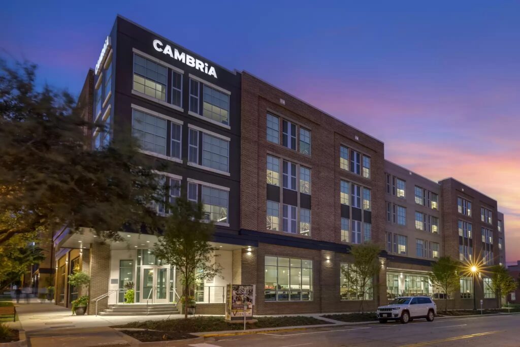 The exterior of the beautiful Cambria Hotel at dusk in Columbia SC